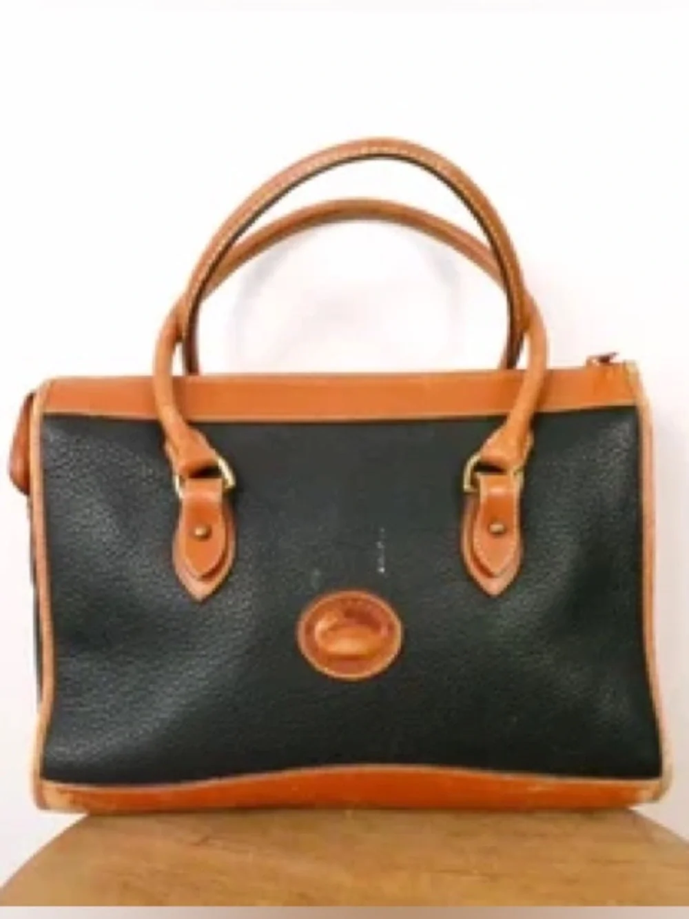 Vintage Dooney & Bourke Black with Tan Trim Leather satchel
